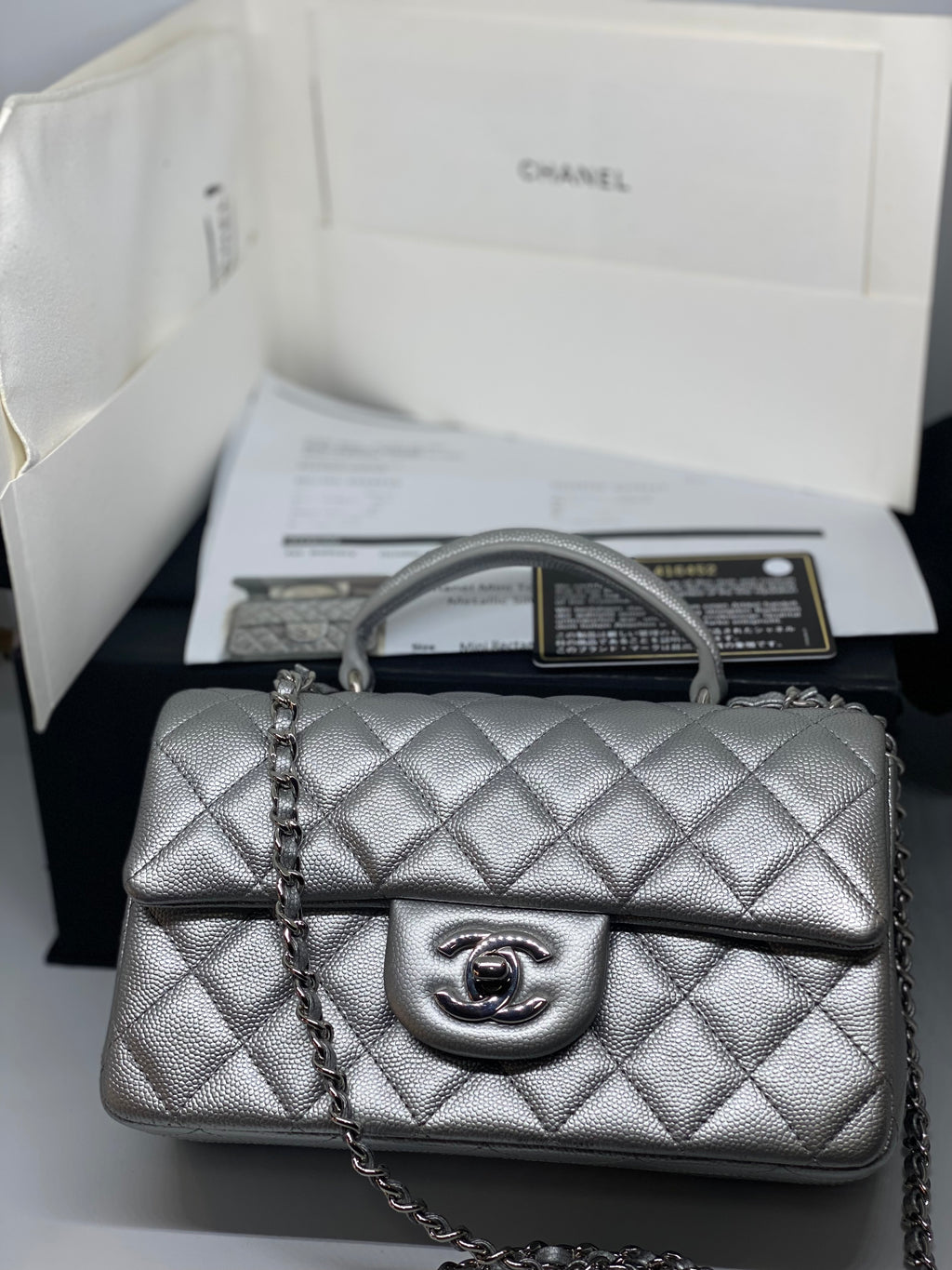 Chanel Mini Rectangular with top handle 21S Black Quilted Caviar with  brushed gold hardware
